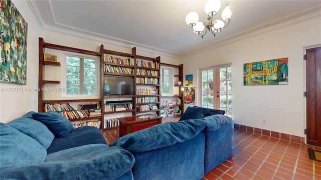 tiled living area featuring french doors, a wealth of natural light, and crown molding