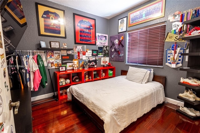 15333 SW 184th St, Miami, FL 33187 - bedroom featuring a textured wall, baseboards, and wood finished floors
