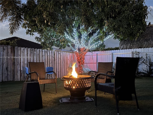 15333 SW 184th St, Miami, FL 33187 - view of patio / terrace featuring an outdoor fire pit and a fenced backyard