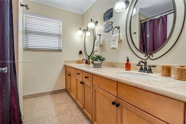 19239 SW 54th St, Miramar, FL 33029 - bathroom with ornamental molding, double vanity, tile patterned floors, baseboards, and a shower with shower curtain