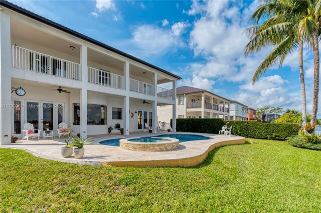 19239 SW 54th St, Miramar, FL 33029 - view of pool with french doors, a ceiling fan, a lawn, and a patio area