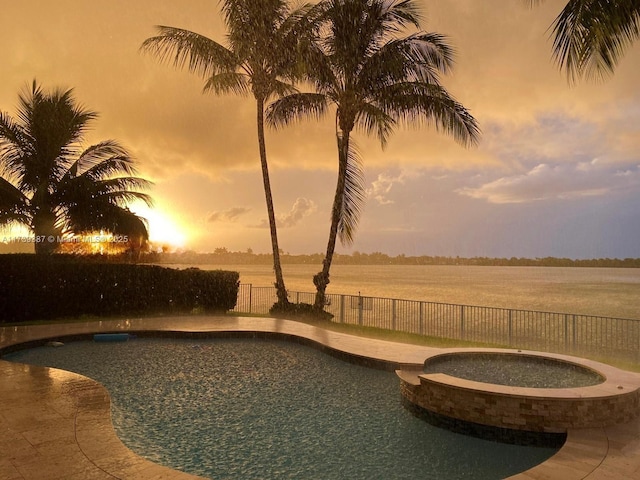 19239 SW 54th St, Miramar, FL 33029 - view of swimming pool with a fenced backyard and a pool with connected hot tub
