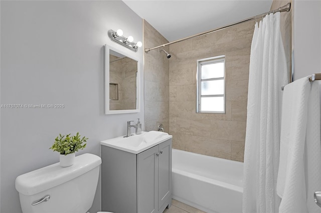 full bathroom with shower / bath combination with curtain, vanity, and toilet