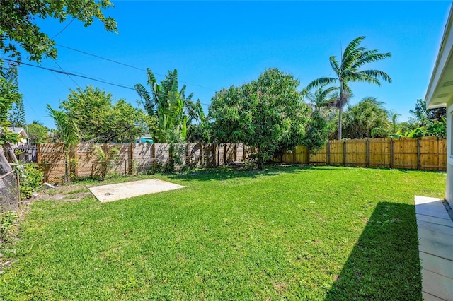 view of yard featuring a fenced backyard