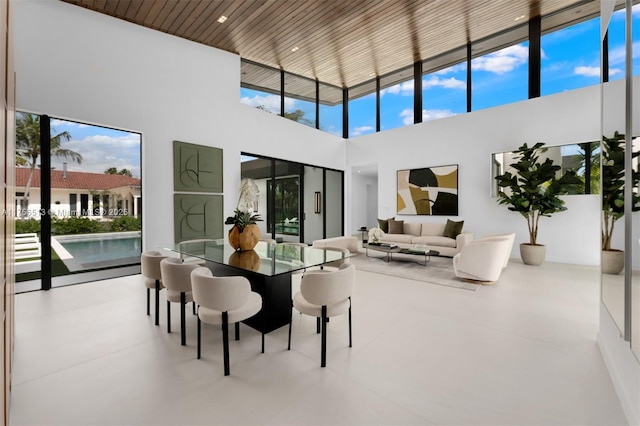 6991 SW 91st St, Pinecrest, FL 33156 - dining area featuring a towering ceiling