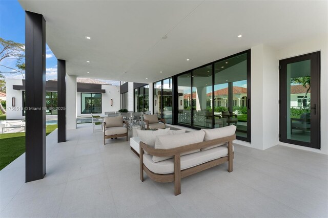 6991 SW 91st St, Pinecrest, FL 33156 - view of patio / terrace with an outdoor hangout area