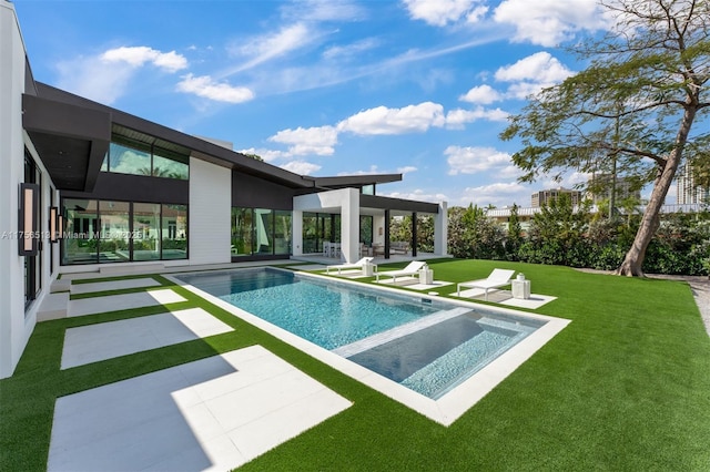 6991 SW 91st St, Pinecrest, FL 33156 - view of swimming pool featuring a patio area, a yard, and an infinity pool