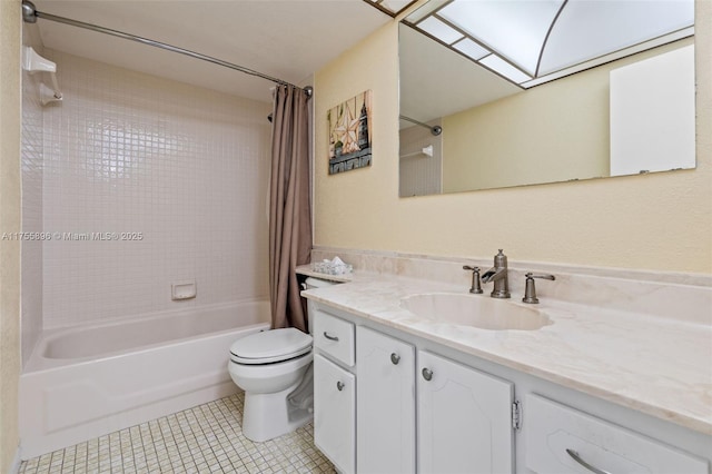 bathroom with tile patterned flooring, toilet, a skylight, vanity, and shower / bath combo with shower curtain