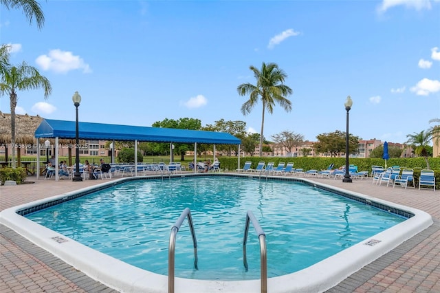 view of swimming pool featuring a patio