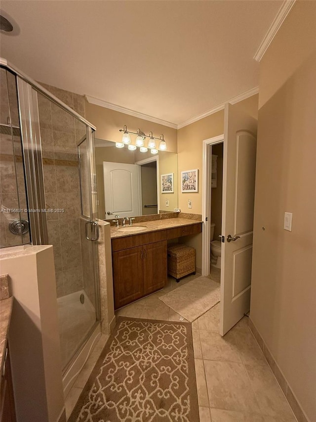 bathroom with toilet, a stall shower, ornamental molding, and vanity