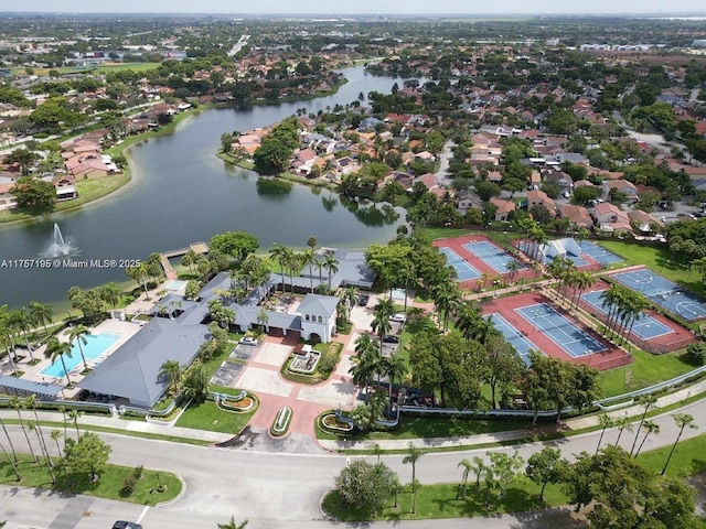 bird's eye view featuring a water view and a residential view