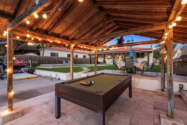 view of patio / terrace with outdoor dining space and fence