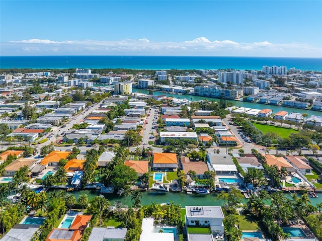bird's eye view with a water view and a view of city