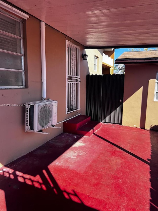 view of patio / terrace featuring ac unit