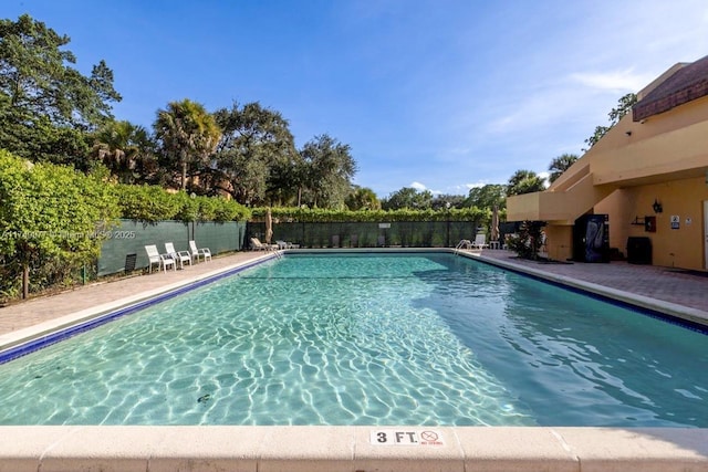 community pool with fence