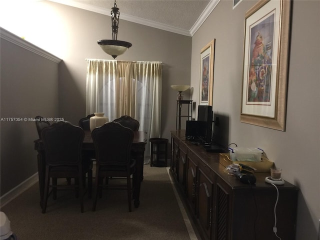 dining space with dark carpet and crown molding