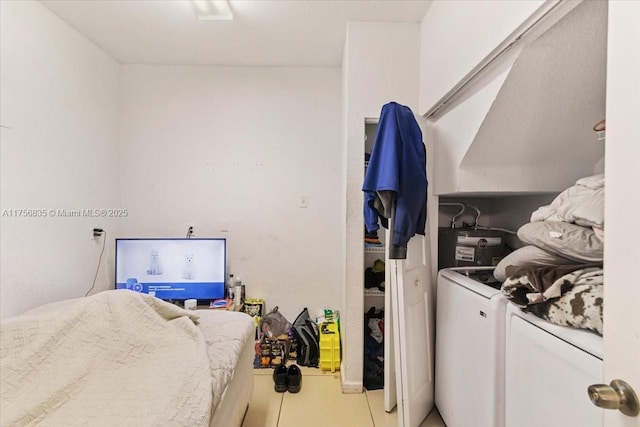 clothes washing area with laundry area and washing machine and clothes dryer