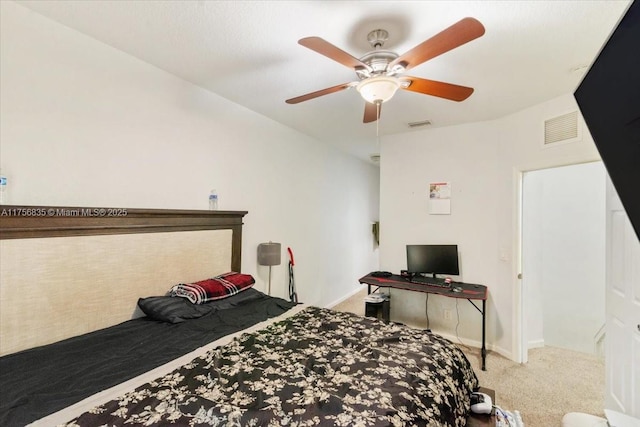 bedroom with baseboards, visible vents, ceiling fan, and carpet flooring