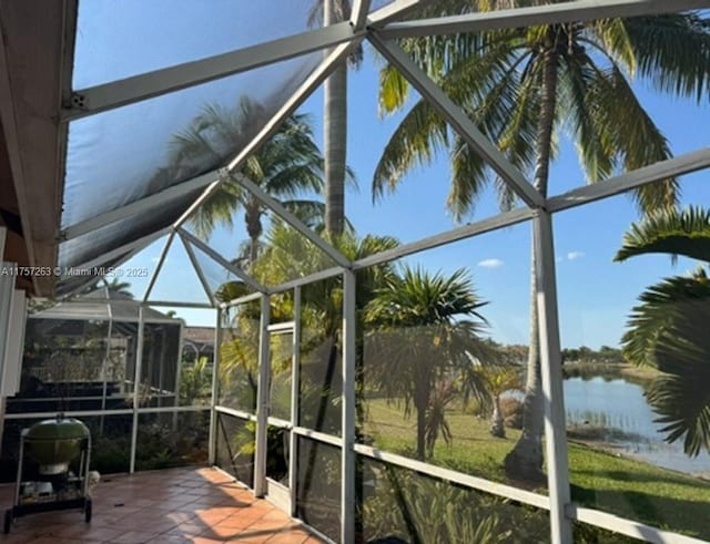 sunroom with a water view
