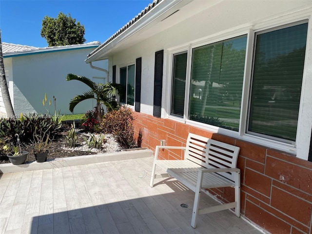 view of patio / terrace featuring a wooden deck