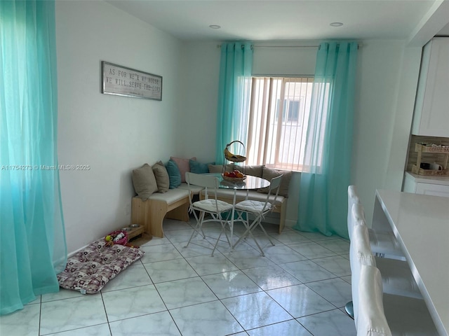 dining room featuring light tile patterned floors