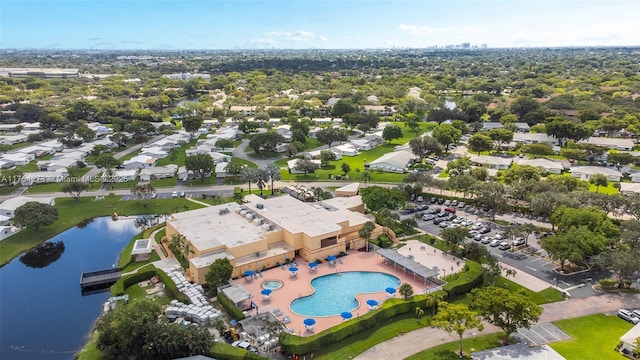 aerial view with a residential view and a water view