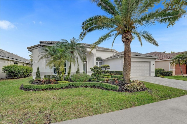 view of front of house with stucco siding, a tile roof, an attached garage, decorative driveway, and a front yard