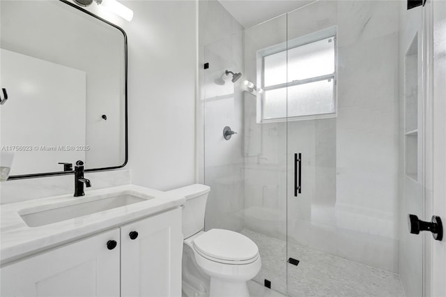 full bath with toilet, a stall shower, and vanity