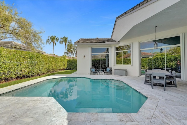 view of pool with a patio and a fenced in pool