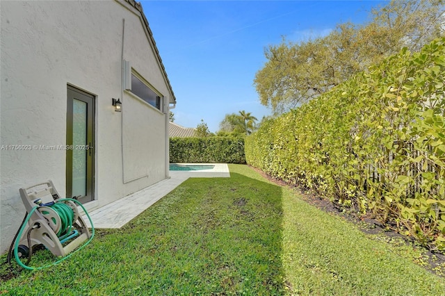 view of yard with a fenced backyard