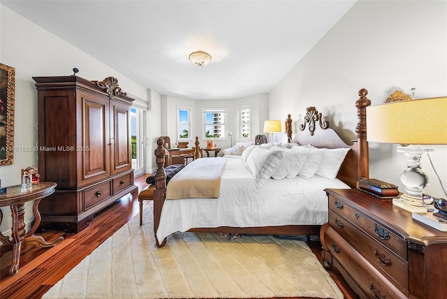 bedroom featuring wood finished floors