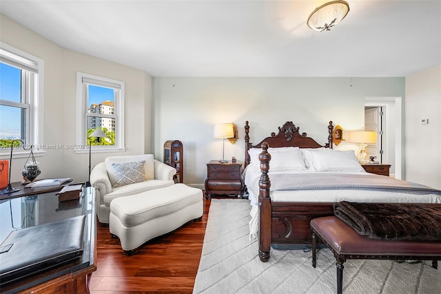 bedroom with wood finished floors