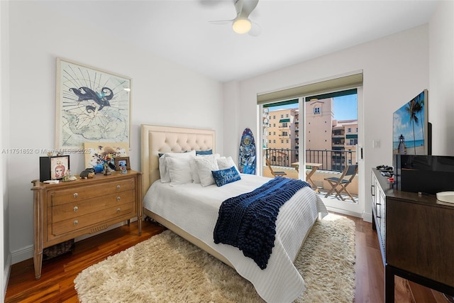 bedroom featuring dark wood-style floors, access to outside, baseboards, and ceiling fan