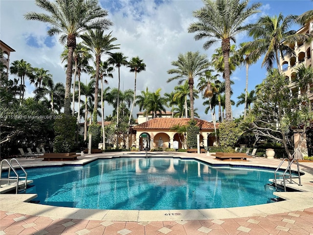 pool with a patio area