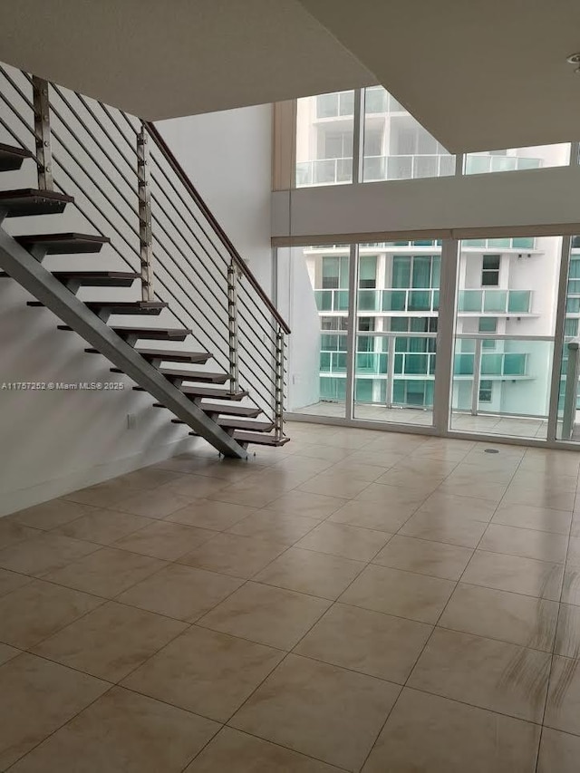 stairs with a high ceiling