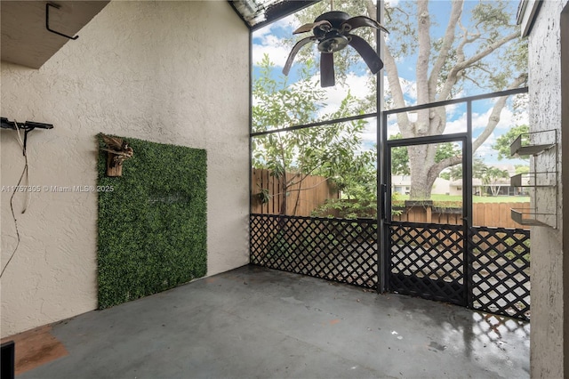 view of patio / terrace with fence and a gate