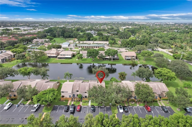 aerial view with a residential view and a water view