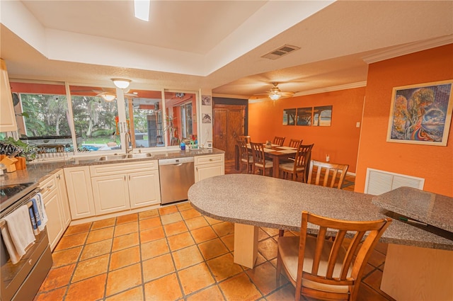 11400 Tara Dr, Plantation, FL 33325 - kitchen featuring appliances with stainless steel finishes, a sink, ceiling fan, a tray ceiling, and crown molding