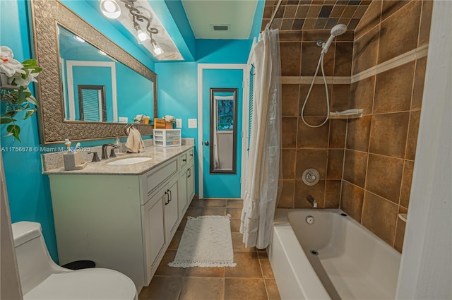 full bathroom featuring shower / bath combination with curtain, visible vents, toilet, vanity, and tile patterned floors