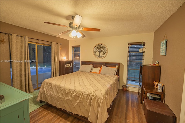 bedroom featuring a ceiling fan, access to outside, a textured ceiling, and wood finished floors