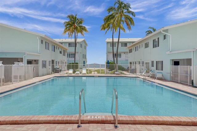 5400 N Ocean Blvd Unit 38, Lauderdale By The Sea, FL 33308 - community pool featuring a residential view