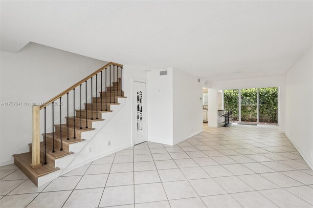 5400 N Ocean Blvd Unit 38, Lauderdale By The Sea, FL 33308 - unfurnished room with light wood-type flooring, washer / dryer, and baseboards