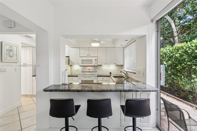 5400 N Ocean Blvd Unit 38, Lauderdale By The Sea, FL 33308 - unfurnished room with light wood-style floors and baseboards