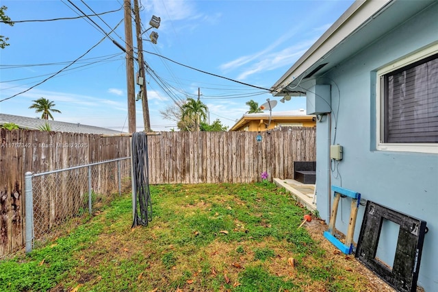 view of yard featuring a fenced backyard