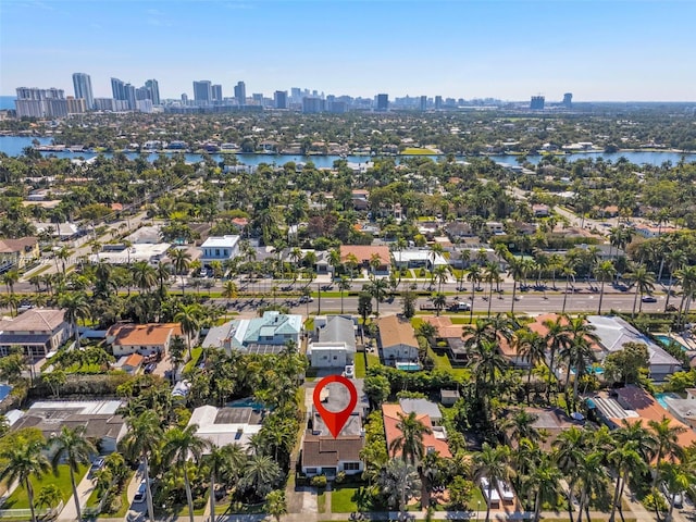 bird's eye view featuring a water view and a view of city