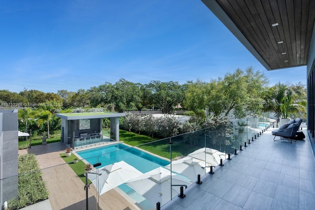 pool with a patio area