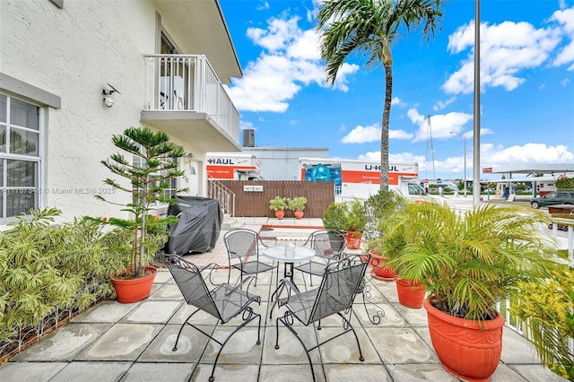 view of patio / terrace featuring area for grilling and outdoor dining space