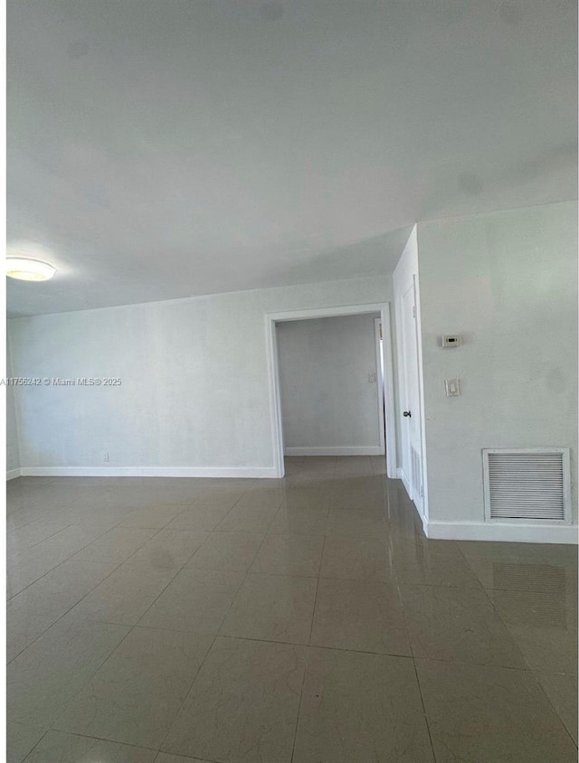 2318 Scott St, Hollywood, FL 33020 - tiled empty room with baseboards