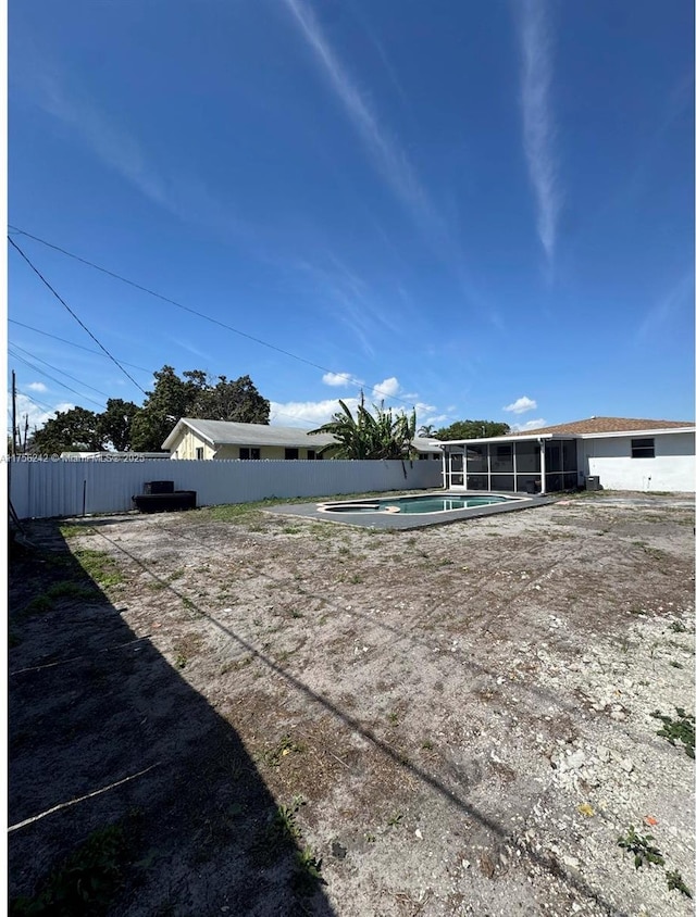2318 Scott St, Hollywood, FL 33020 - view of yard featuring a sunroom