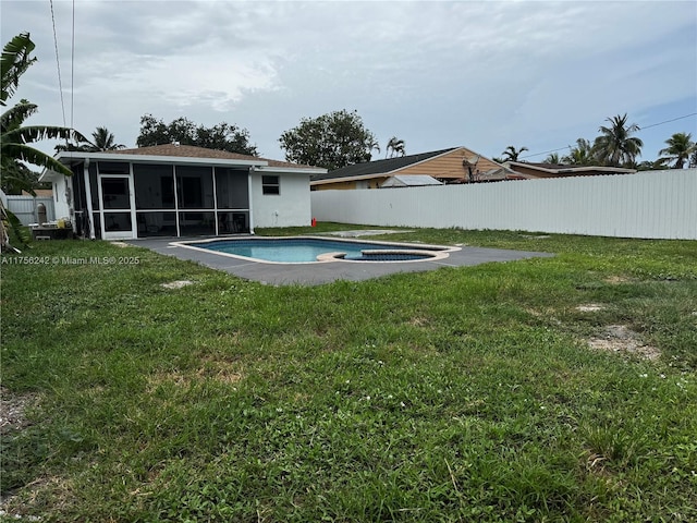 2318 Scott St, Hollywood, FL 33020 - rear view of house with a sunroom